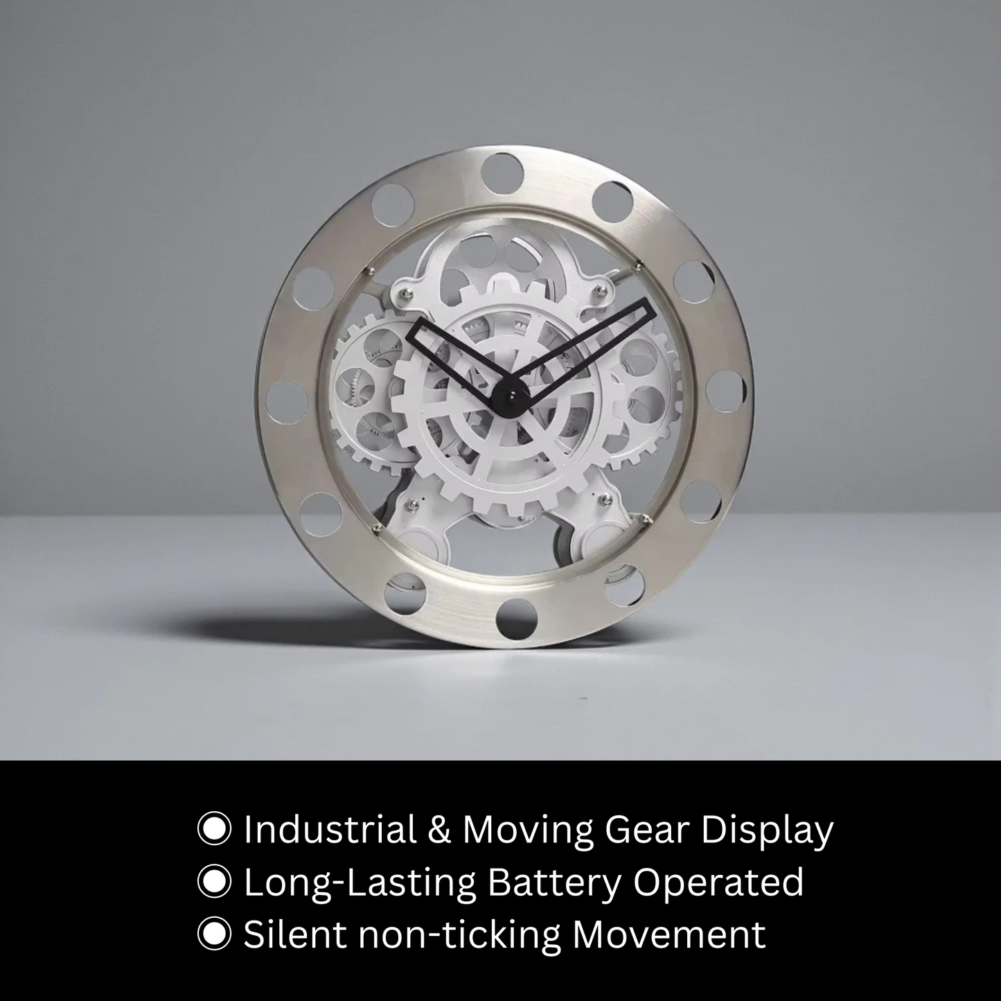 Modern Wall Clock Design - Elverton features exposed white gears and black hands within a circular metal bezel with round cutouts, offering a silent, industrial aesthetic, perfect for transforming walls into kinetic art.