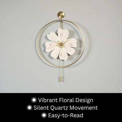 Flower wall clock - Fenton: A white flower-shaped clock with gold hands, minimalist numerals, and a short pendulum, elegantly enclosed in a thin gold hoop, adding springtime charm to any room.