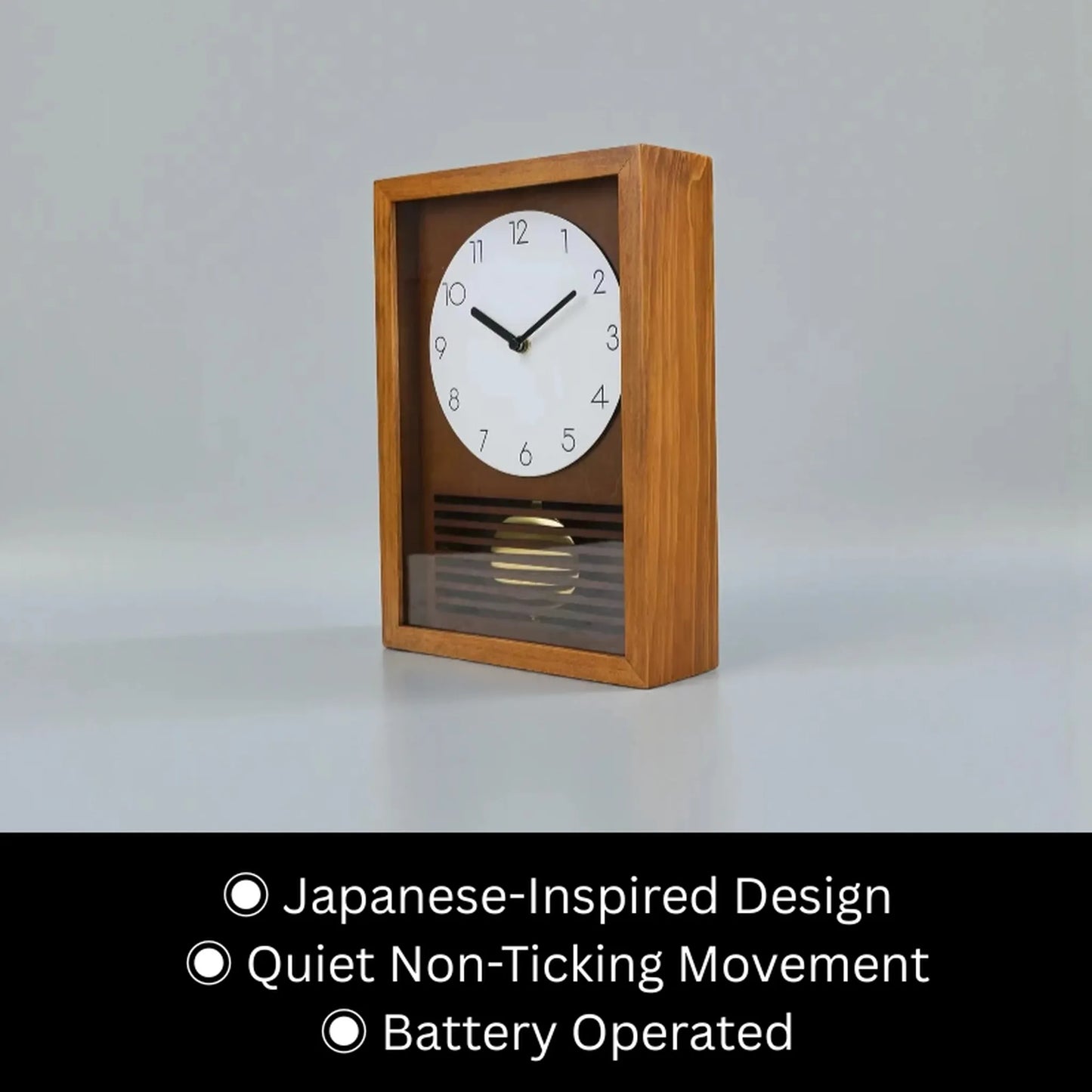 Japanese Wall Clock - Lexton: A minimalist wooden clock with an oak-tone frame, white dial, black hands, and visible pendulum. Features a Japanese-inspired design, quiet sweep movement, and battery operation.