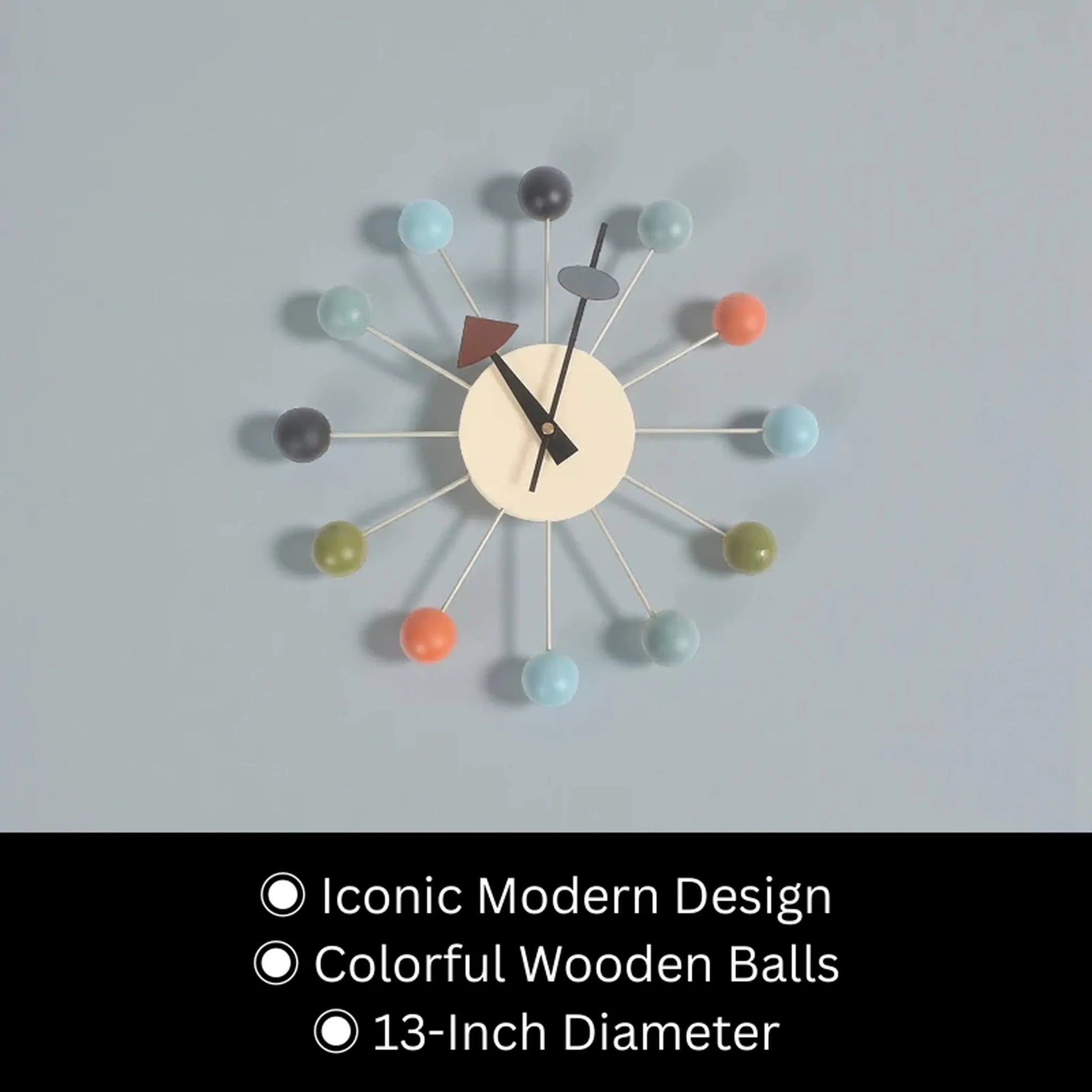 Side angle view of 12 inch sunburst clock showing dimensional sphere details