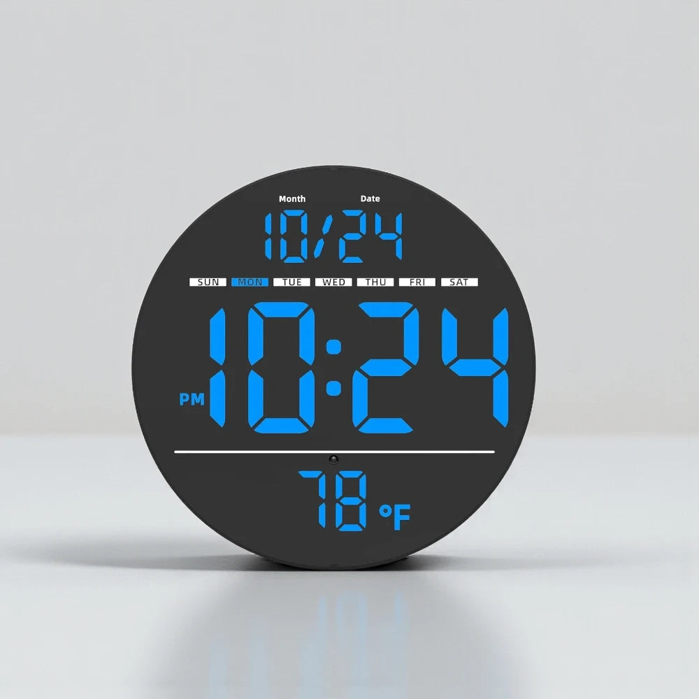 Digital Wall Clocks - Hadley: Round black clock with blue LED displaying date, day, time, and temperature, offering a sleek, modern touch to any home or office decor.
