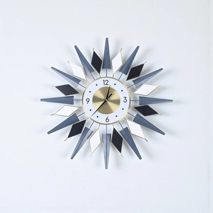Big Decorative Wall Clocks - Denley features a striking design with three-dimensional spikes and diamond shapes, centered around a round analog face, embodying mid-century modern elegance.