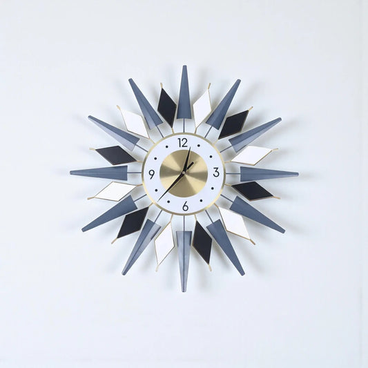 Big Decorative Wall Clocks - Denley features a striking design with three-dimensional spikes and diamond shapes, centered around a round analog face, embodying mid-century modern elegance.