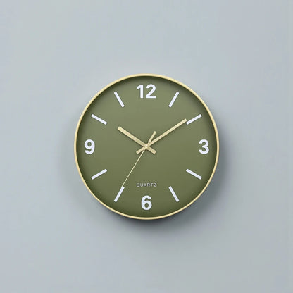 Modern Silent Wall Clock - Densford features a muted olive-green face, slim gold-toned frame, and white numerals. Its minimalist design with silent quartz movement adds elegance to any room.