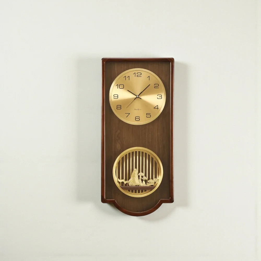 Wood Analog Wall Clock - Eastley features a gold clock face with Arabic numerals and hands above a decorative gold grille showcasing a miniature scene, all set in a hardwood frame.