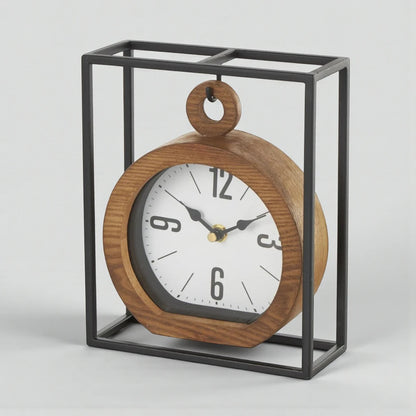 Suspended Clock - Jarwin: A round wooden clock face with black hands, elegantly suspended in a rectangular black metal frame, offering a modern, geometric design for a mantel or desk.