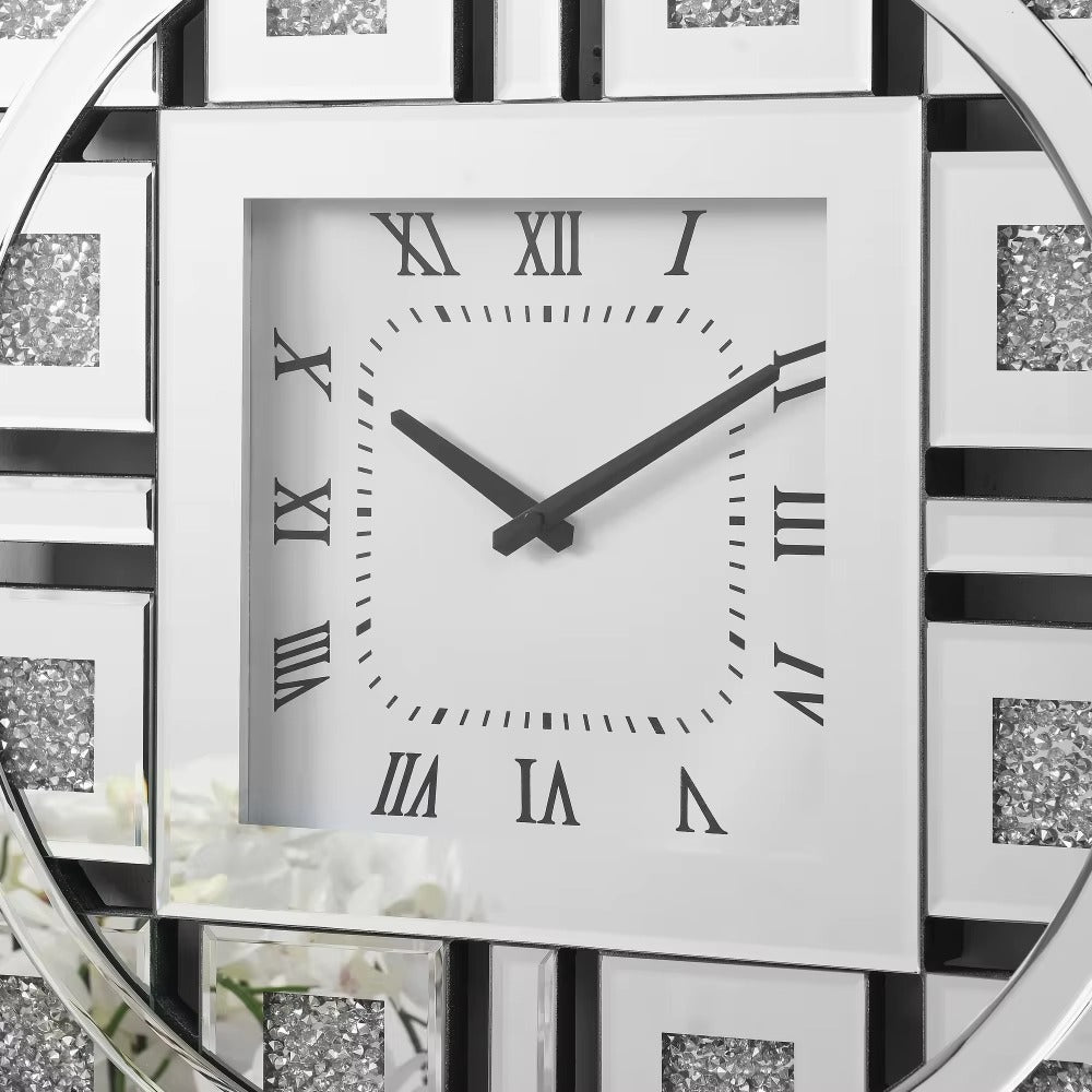 Decorative mirror wall clock - Stratton features a square white face with black hands, Roman numerals, and a mirrored geometric frame with a crushed diamond inlay, adding glamour to any room.