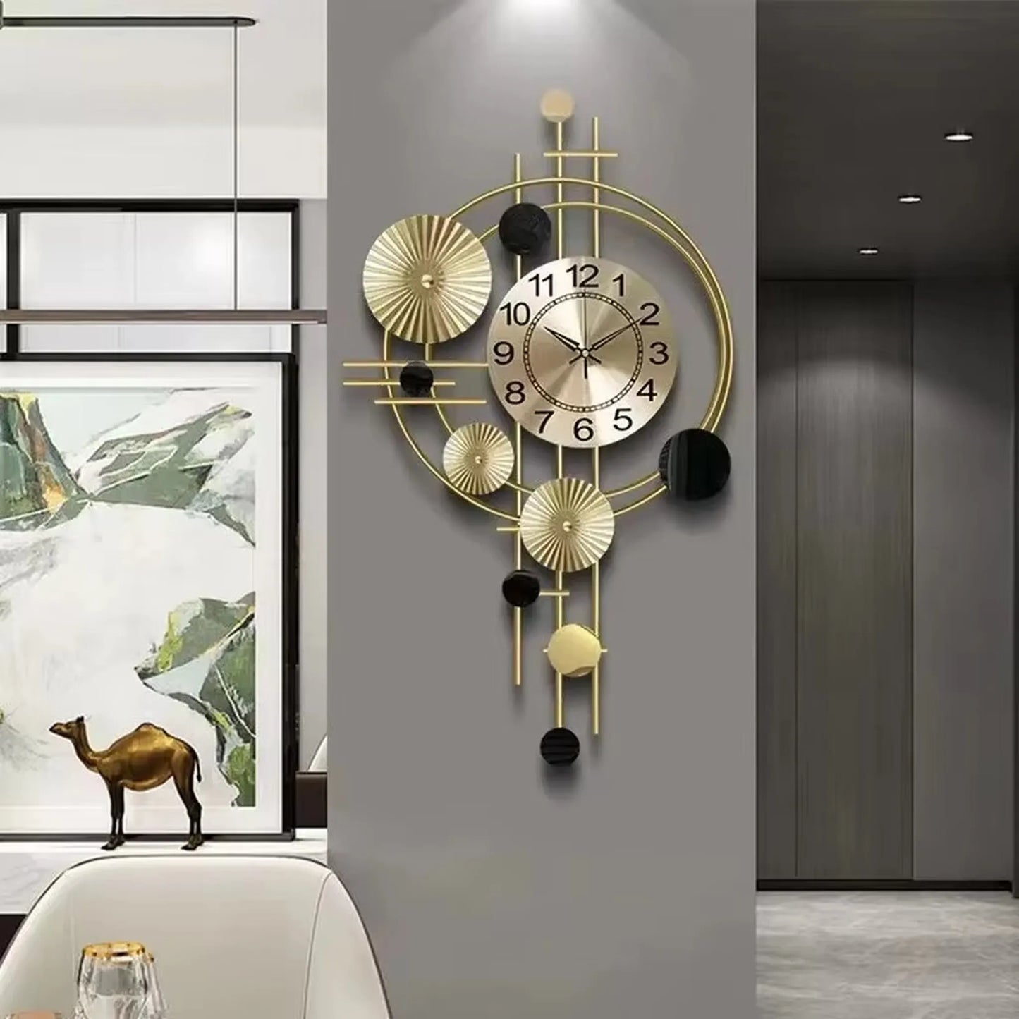 Oversized wall clock modern - Hashford: A gold-metal clock with concentric rings and black accents, featuring a minimalist design with floating numerals and brass hands, perfect for elegant modern decor.