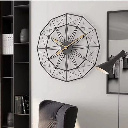 Modern Style Wall Clock - Blenford: A large, open-frame geometric wall clock with black metal wire and gold hands, showcasing minimalist elegance above a dark chair, amidst sleek shelving and decor.