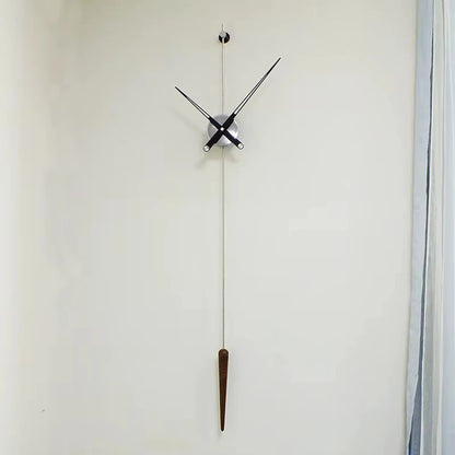 Mid century modern wall clock - Ellroy by The Horologista features slim black hands and a walnut pendulum, creating a minimalist, sculptural design with a 45-inch vertical baton on a plain wall.