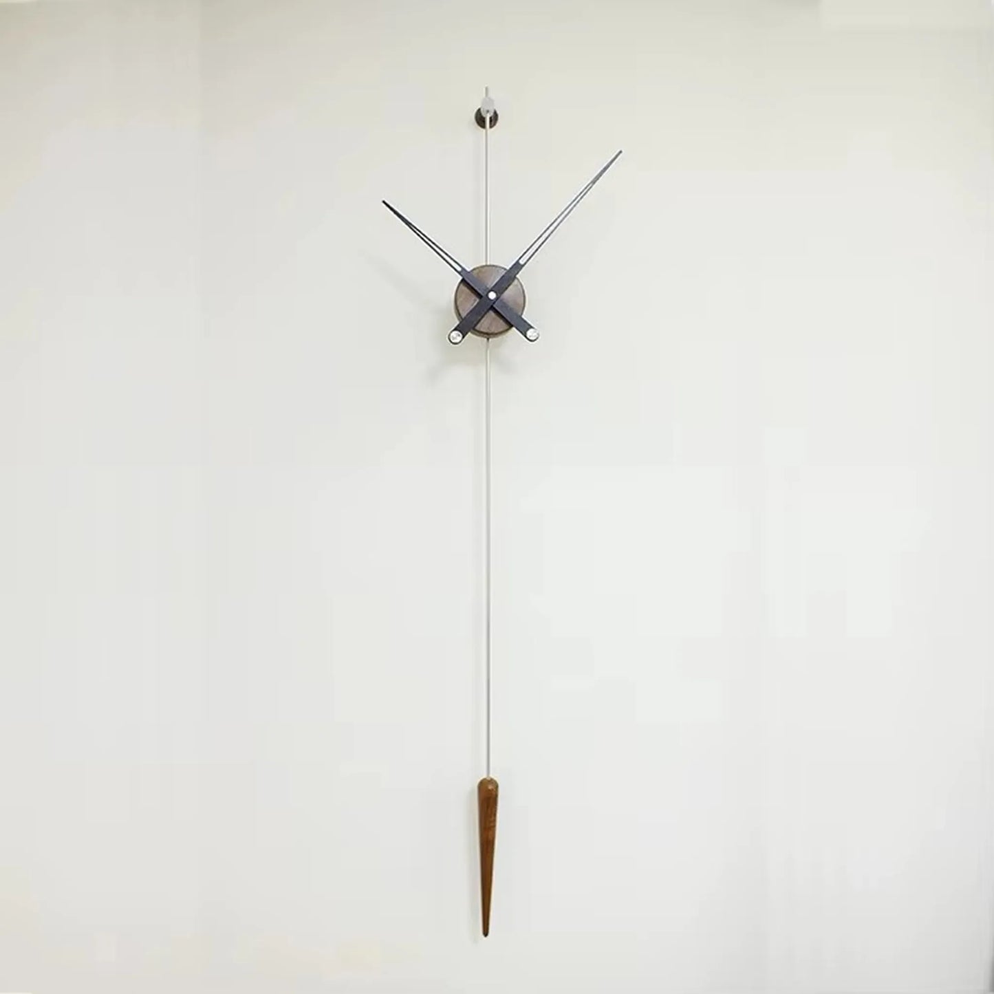 Mid century modern wall clock - Ellroy: A minimalist, sculptural clock with floating black hands and a walnut pendulum, embodying pure form without a traditional face, from The Horologista's unique collection.