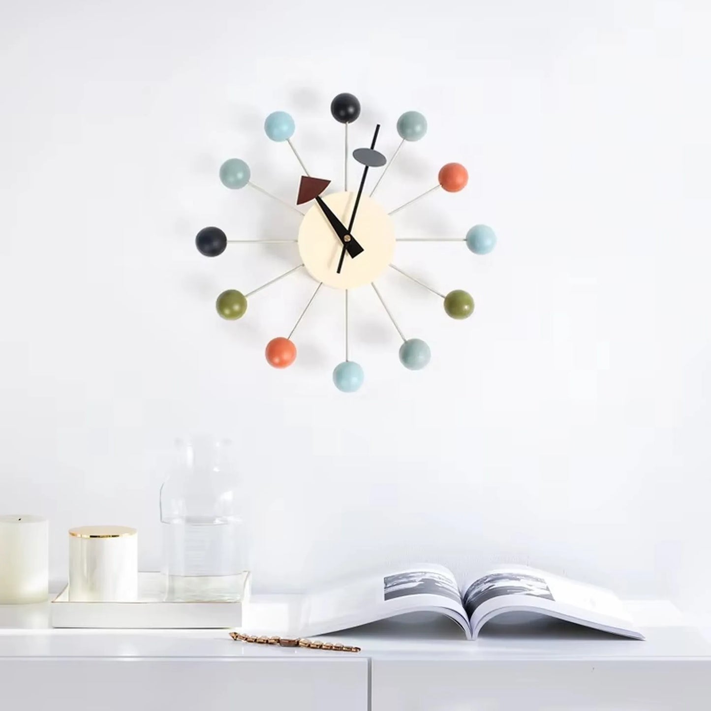 Round decorative clock positioned in home office with clean desk setup