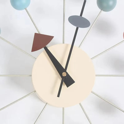 12 inch round wall clock displayed with size reference above console table