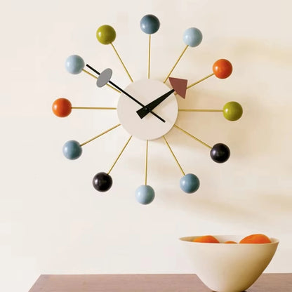 Atomic wall clock hung in modern bedroom with minimalist decor
