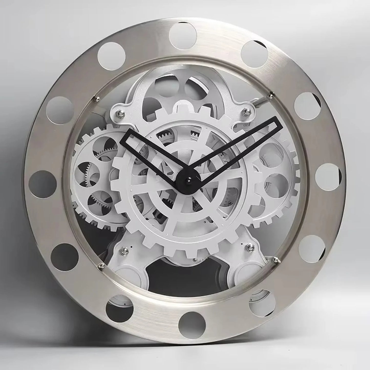 Modern Wall Clock Design - Elverton showcases exposed white gears and black hands, framed by a riveted gun-metal trim, transforming your wall into a silent, mechanical sculpture.