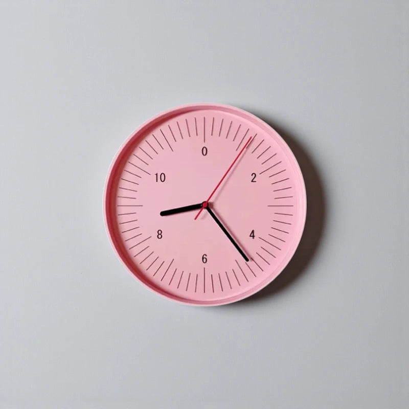 Numbers wall clock - Dunmore: A minimalist round wall clock with bold numerals at every even hour, featuring black hour and minute hands, and a red second hand on a sleek, contemporary design.