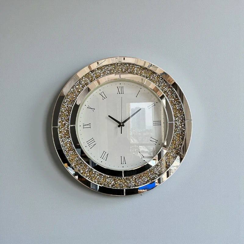 Fancy wall clock - Norwyn, featuring a white face with black Roman numerals and a mirrored bezel with sparkling crystals, creating a glamorous focal point for any room.
