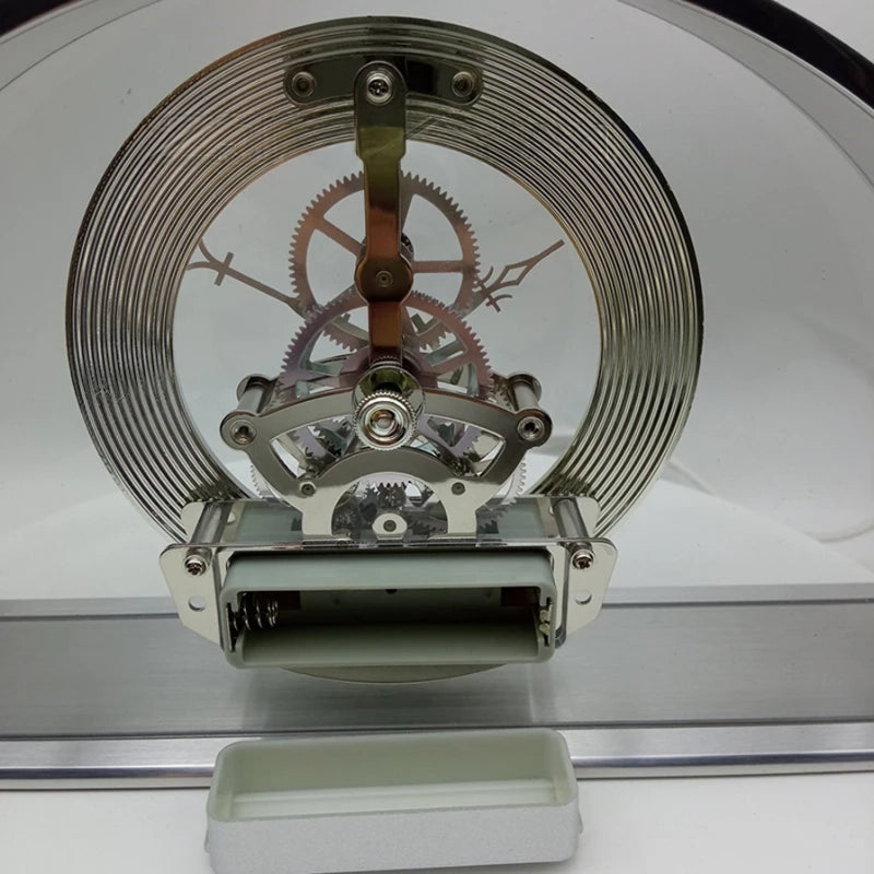 Crystal table clock - Cranley, showcasing a skeleton clock movement with visible mainspring, interlocking gears, and hand shafts, ideal for a unique table display or special occasion gift.