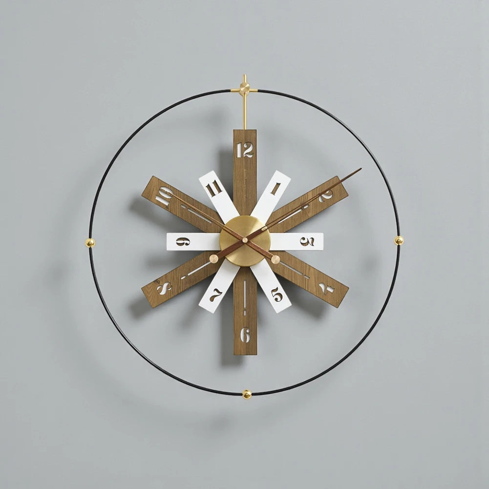 Modern Lounge Wall Clocks - Fremton features a brass hub with walnut and white spokes and cut-out numerals, framed by a thin black ring, perfect for contemporary spaces from The Horologista.